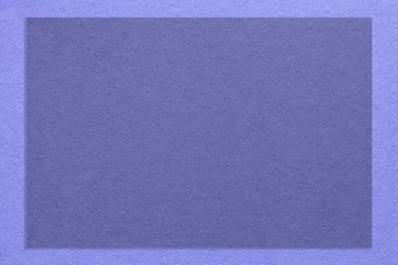 Photo sur Plexiglas Pantone 2022 very peri Texture of craft violet color paper background with lavender border, macro. Structure of kraft very peri cardboard