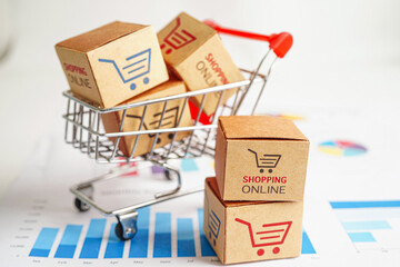 Online shopping, Shopping cart box on business graph, import export, finance commerce.