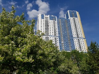 Multi-storey building against the blue sky