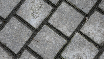 Obraz premium paving stones texture. facing gray tiles as a vintage background