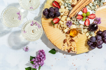 Antipasto platter, Antipasto Cheese board of various types of soft and hard cheese. spanish manchego cheese, aperitivo party concept, banner, menu, recipe place for text