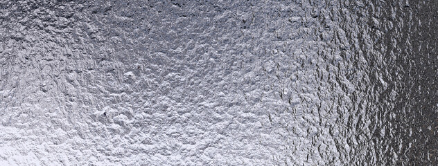 Monochrome matte metal background. Abstract metal texture. Tinfoil. Wide 3d illustration