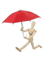 Running wooden figurine with red umbrella isolated on white background