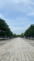 Straight Line of sidewalk path to the Imperial palace of Japan in Tokyo, street of Tokyo Marunouchi district year 2022 June 19th