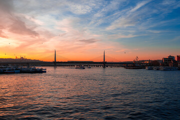 Fototapeta premium Boats in sea and scenic sunset in Istanbul