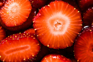 Close-up of strawberry in a saucepan. Preparation of strawberry jelly, marmalade or sauce.