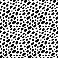 Stylish simple polka dot seamless pattern. Diagonal vector black small brush strokes. Black uneven specks, spots, ink blobs. Dots of different size texture. Abstract monochrome background.