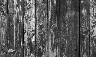 Old black rural wooden wall, background texture