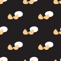 Seamless pattern with eggs and egg shells. On black background.