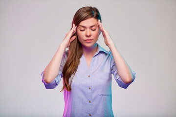 Woman with headache and eyes closed touching her head. business woman isolated portrait.