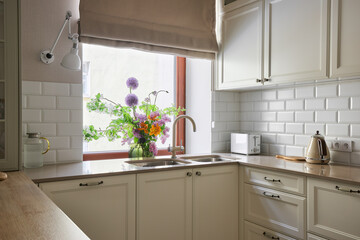 Vase with beautiful magnificent bouquet on the table