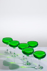 Bright green estragon lemonade at studio