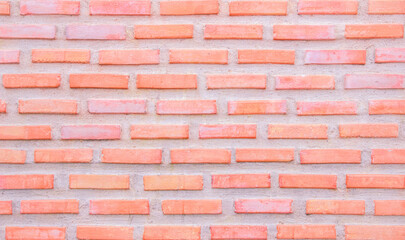 Orange and white brick wall texture background. Brickwork and stonework flooring interior rock old pattern clean concrete grid uneven bricks design. 
