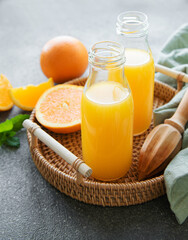 Bottles of fresh orange juice