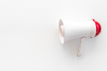 Fototapeta premium White loudspeaker for announcing hiring or advertising. Megaphone device