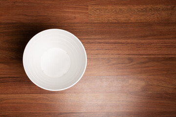 empty trash can on the floor with copy space, top view