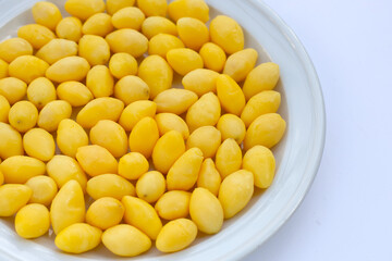Boiled ginkgo nuts on white background.