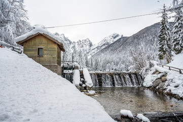 Obraz premium Snow winter in Fusine. Magic of the lower lake.