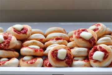 Serving plate with small pizzas