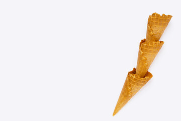 Empty ice cream cone on white background.