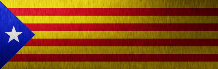 Banner of grunge Catalan flag. Dirty Catalonia flag on a metal surface.