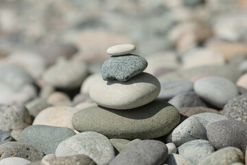 Obraz na płótnie Canvas Balanced stones background. Stone pyramid. Zen.