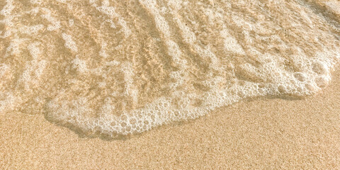 Fototapeta na wymiar sand on the beach with wave