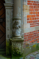Stone Pillar in a doorway with carved details. Built in the renaissance period.