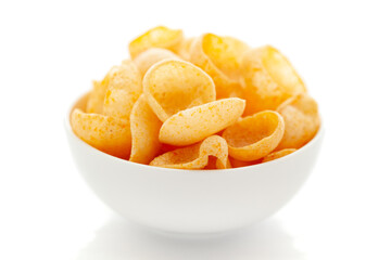 Close up of Cheese Puff Snacks cream color, Popular Ready to eat crunchy and puffed snacks cheesy...