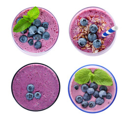 Set with delicious blueberry smoothies on white background, top view