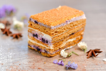 dessert blueberry napoleon cake on a wooden board