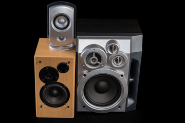 Fototapeta premium Three different home loudspeaker systems on a black background