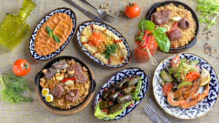 oriental brunch on the table many dishes with cocktails