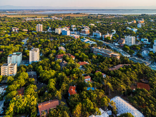 Obraz premium Sunrise in Lignano Sabbiadoro seen from above. From the sea to the lagoon, the city of holidays