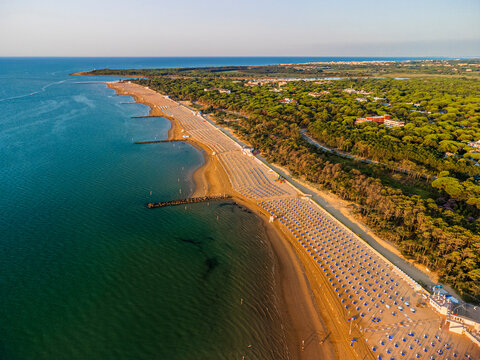 Sunrise in Lignano Sabbiadoro seen from above. From the sea to the lagoon, the city of holidays