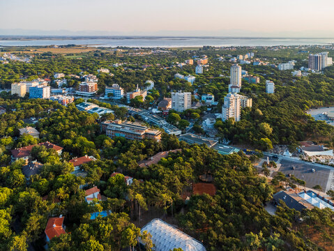Sunrise in Lignano Sabbiadoro seen from above. From the sea to the lagoon, the city of holidays
