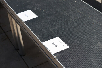 seat with invitations before Rick Owens Spring Summer 2023 runway show
