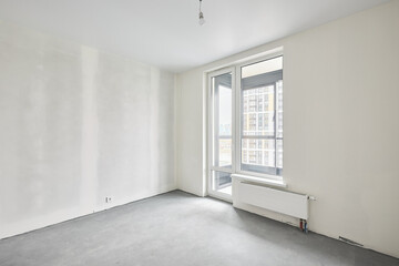 Interior of new apartment without finishing in gray tones