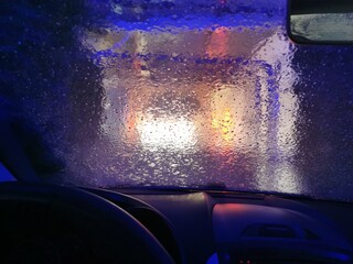 View of an automatic car wash from inside a car