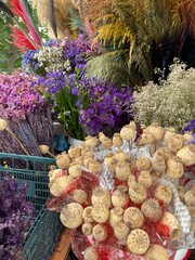 close-up photo of various bright juicy natural dried flowers and poppies in a basket. High quality photo