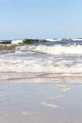 High and dangerous waves on the beach of Zempin on the island of Usedom on a beautiful day - obrazy, fototapety, plakaty