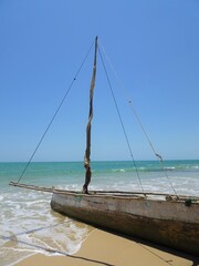 Fototapeta premium The wooden boat on the water's edge(Morondava, Madagascar)