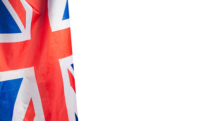 Fototapeta The flag of the United Kingdom is on the left side over a white background obraz