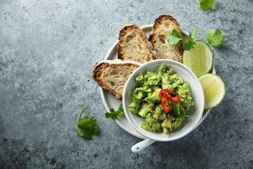 Homemade avocado dip with chili pepper
