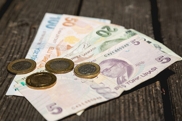 Lira money of the Republic of Turkey on a wooden table