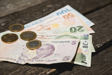 Lira money of the Republic of Turkey on a wooden table