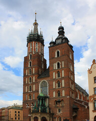 Fototapeta na wymiar Church of St. Mary in the main market square (Rynek Glowny) in the city of Krakow in Poland 