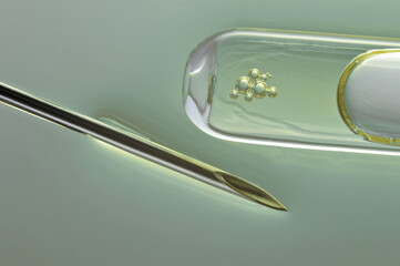 Ovum with a needle for artificial insemination or in vitro fertilization. The concept of genetic...