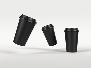 Three black takeaway coffee cups mockup on gray background.