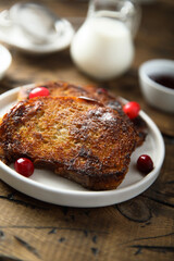Homemade French toast on a white plate